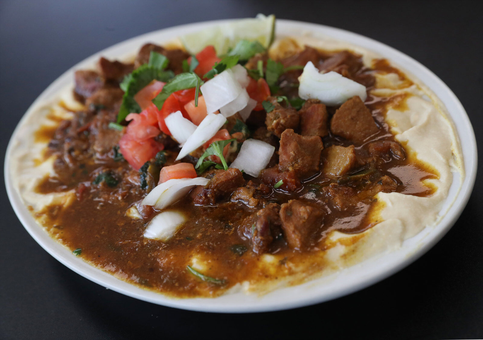 Beef Gallaba on Hummus at Almandi Restaurant